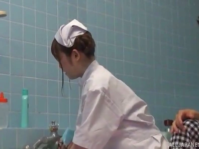 Passionate Japanese Nurse Moans Loudly During Patient's Steamy Fuck Session