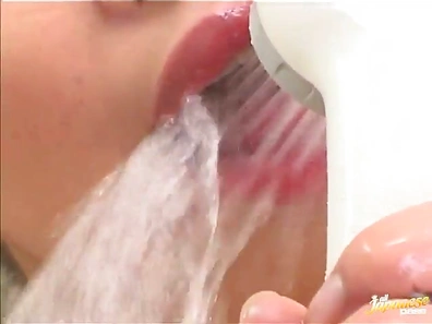 Seductive Japanese Beauty Basks Naked Under Creamy Milk Shower