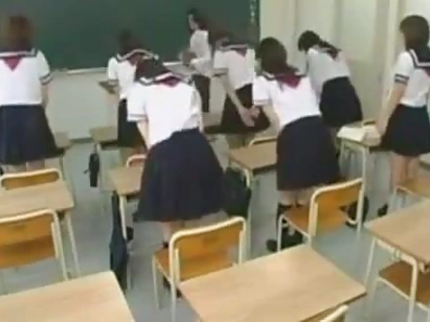 Sensual Japanese Teacher Takes Charge in Explicit Classroom Encounter