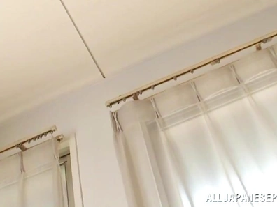 Adorable Japanese babe Tsubomi frills her slit with a sex toy