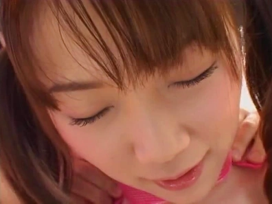 Horny young Japanese AV Model with pigtails sucks two dicks