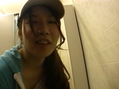 Young sporty Asian babe gives head in the shower