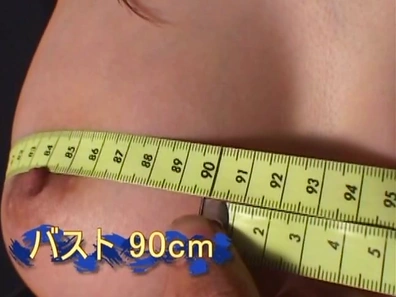 Busty Japanese hottie gets her big tits measured and moistened