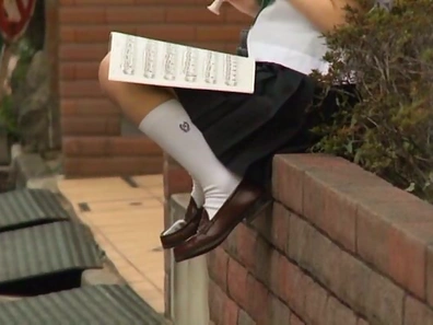 Sexy Asian schoolgirl is outdoors and horny