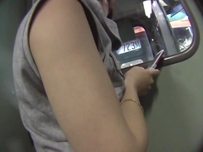 Hot Japanese chick gets fondled and fingered by a group of guys in public