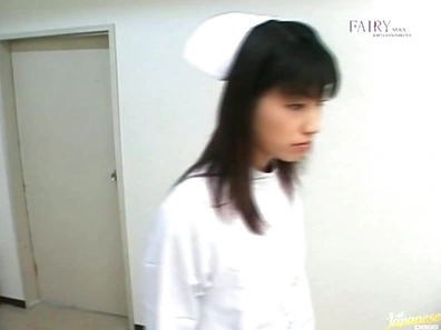 Sexy nurse Saki Budou gives a quick handjob to her male patient